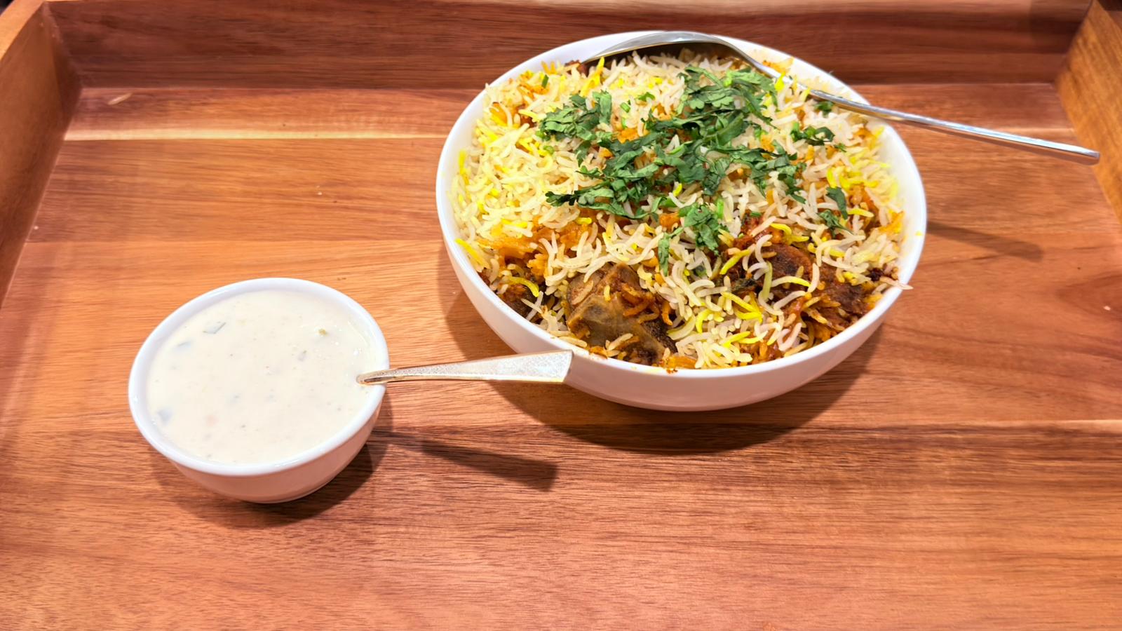 Lamb Biryani with raita at Tandoor and Chai Indian Pakistani restaurant Bedford Perth