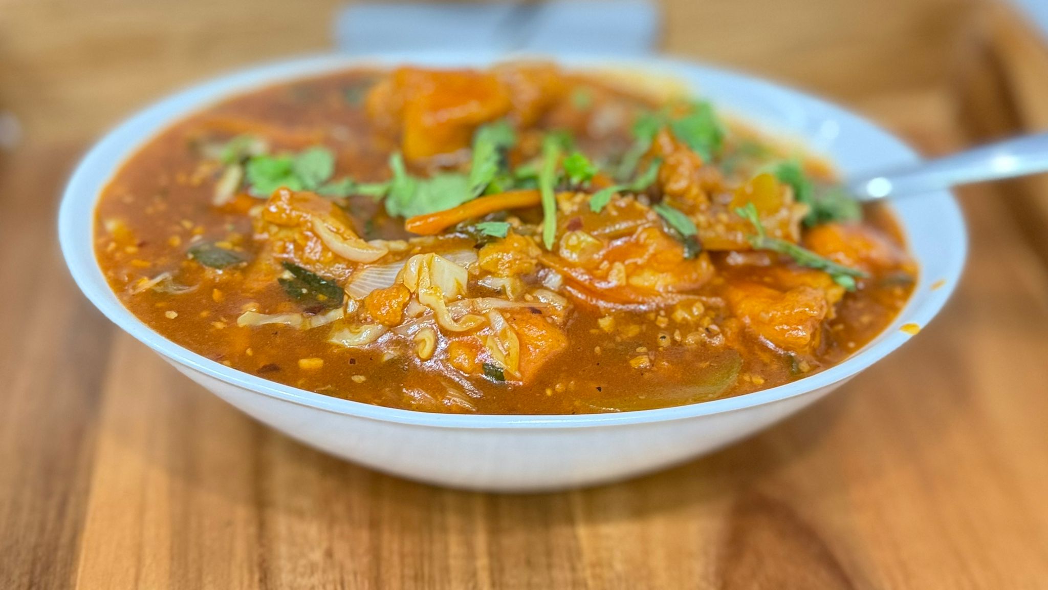 Chicken Manchurian with savory sauce and vegetables at Tandoor and Chai Bedford Perth